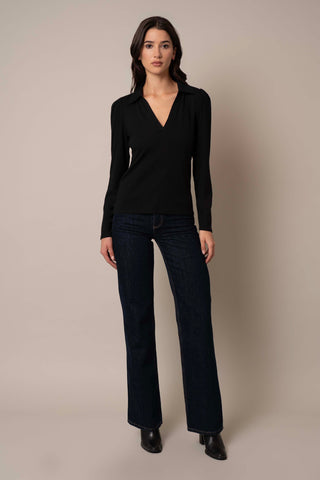Model is wearing the Ribbed Long Sleeve Shirt With Collar in Black.